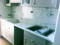 Carrara C Bänkskiva och stänkskydd. Tidslös design